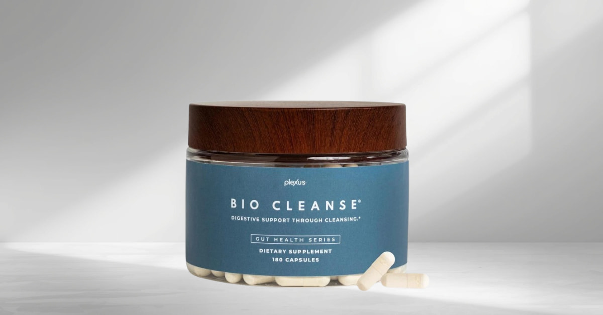 Plexus Bio Cleanse dietary supplement bottle with a wooden lid and blue label, for digestive support and gut health, with 180 capsules visible.