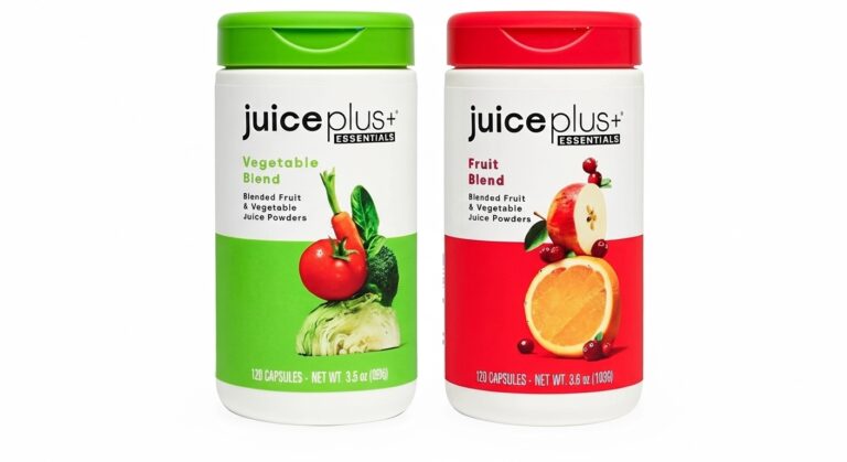 Two bottles of Juice Plus+ Essentials capsules: Vegetable Blend (green label) and Fruit Blend (red label). These are blended fruit and vegetable juice powders dietary supplements, providing essential daily nutrition.